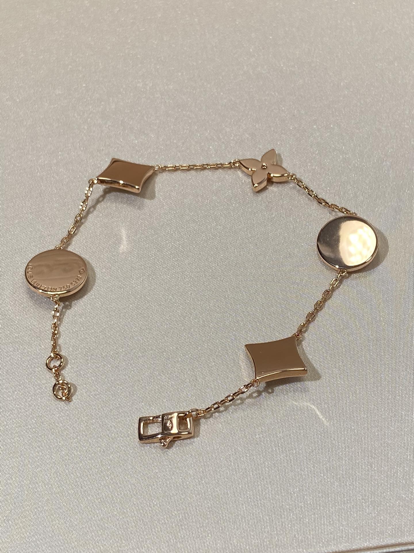 Mysitc STAR AND SUN 5 MOTIF MOP PINK GOLD BRACELET