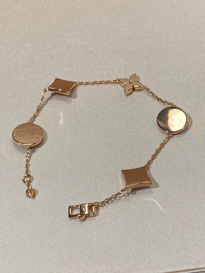 Mysitc STAR AND SUN 5 MOTIF MOP PINK GOLD BRACELET