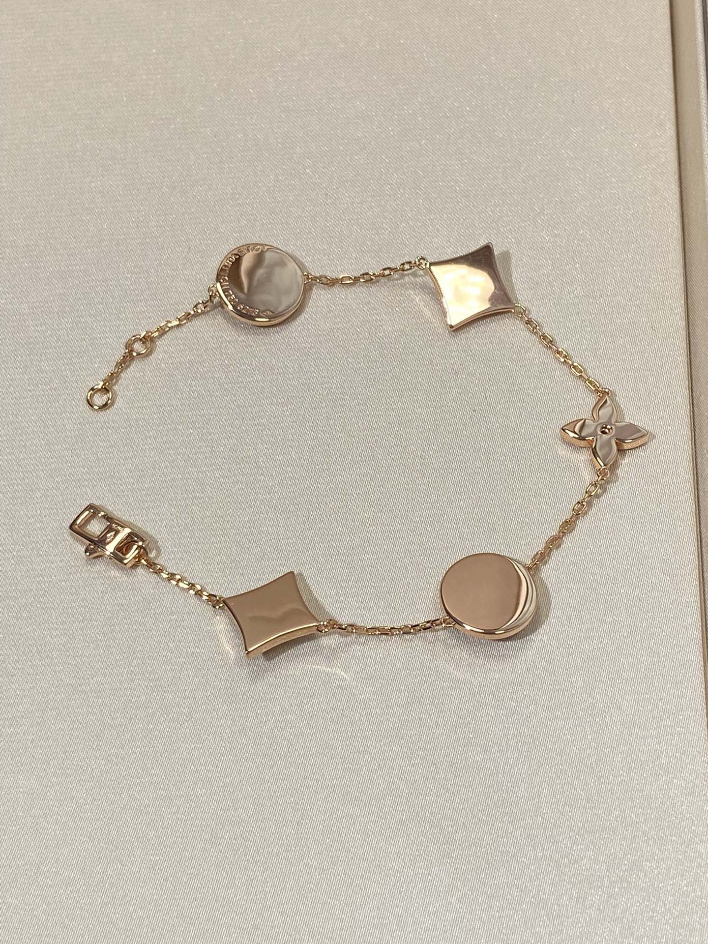 Mysitc STAR AND SUN 5 MOTIF MOP PINK GOLD BRACELET