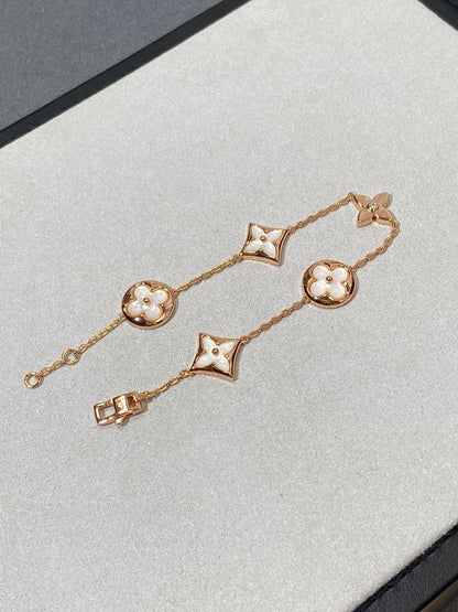 Mysitc STAR AND SUN 5 MOTIF MOP PINK GOLD BRACELET