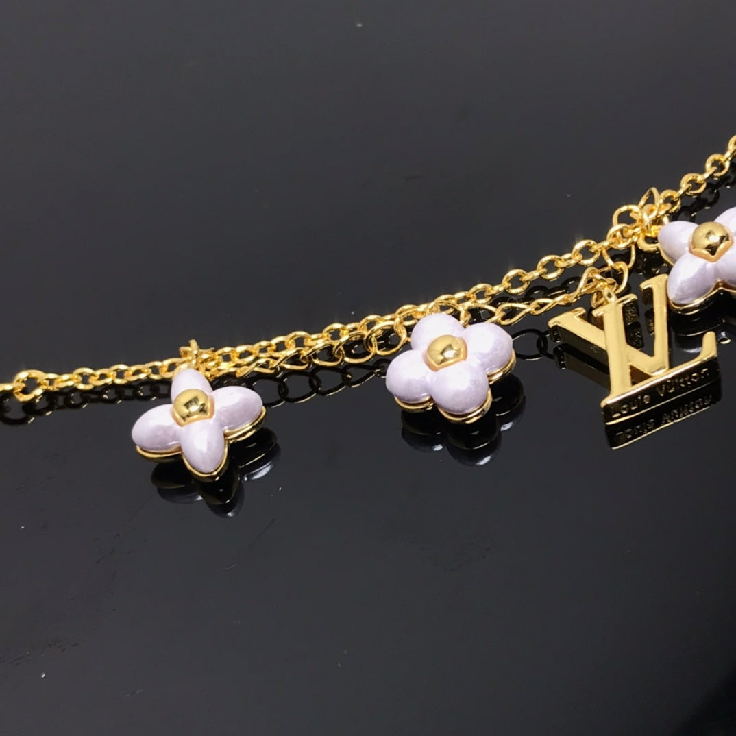 Mysitc LOGO 6 MOTIF STAR AND SUN GOLD BRACELET