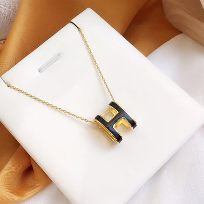 Mysitc HM CLIC BLACK ENAMEL GOLD NECKLACE